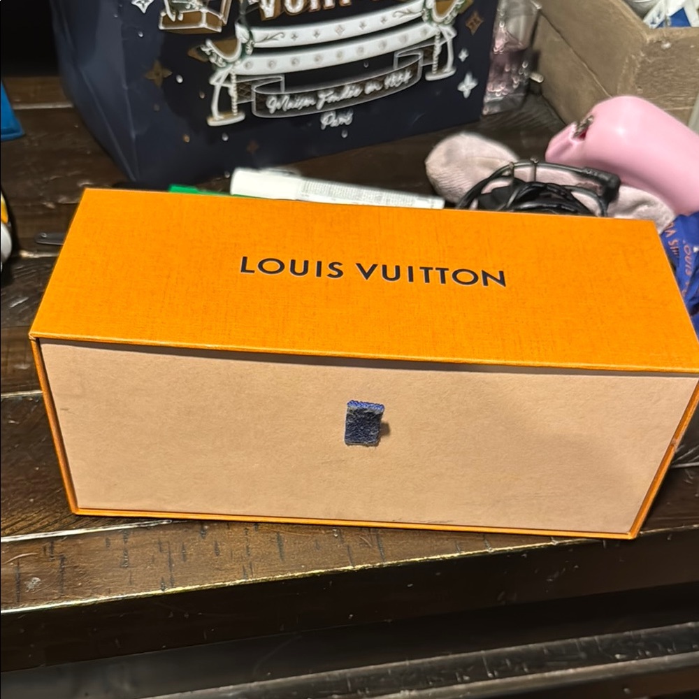 Slide open Louis Vuitton Orange and Tan Box